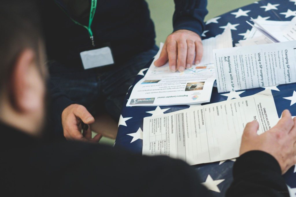 People discussing a document